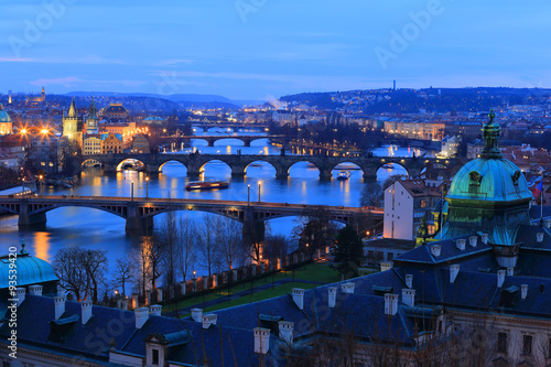 Photography Colorful evening Prague City with its Bridge sabove River Vltava, Czech Republ