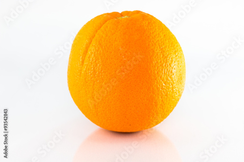 Ripe orange isolated on white background.