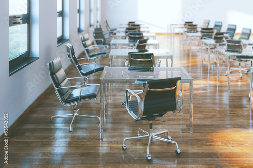 Modern office interior with leather chairss and wood floor photo