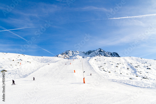 downhill skiing, snow-capped mountains