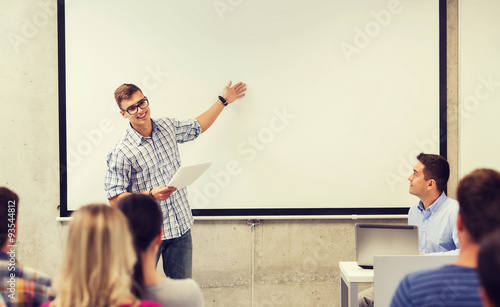 group of students and teacher in classroom