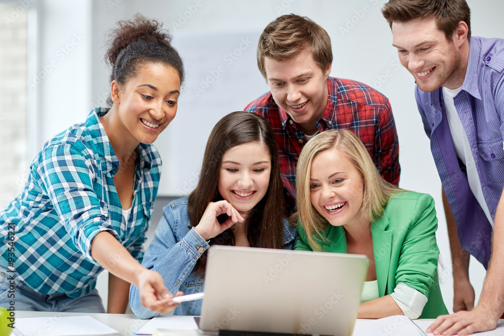 group of happy high school students with laptop group of happy high school students with laptop