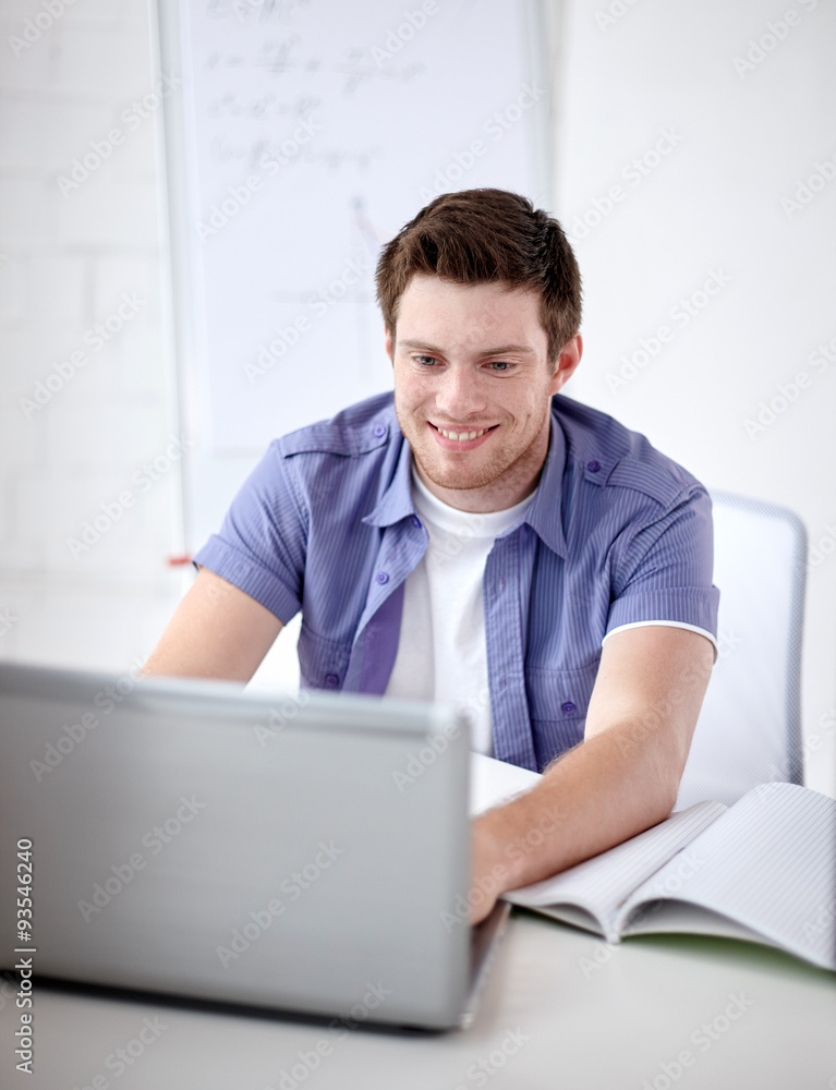 high school student with laptop in classroom high school student with laptop in classroom