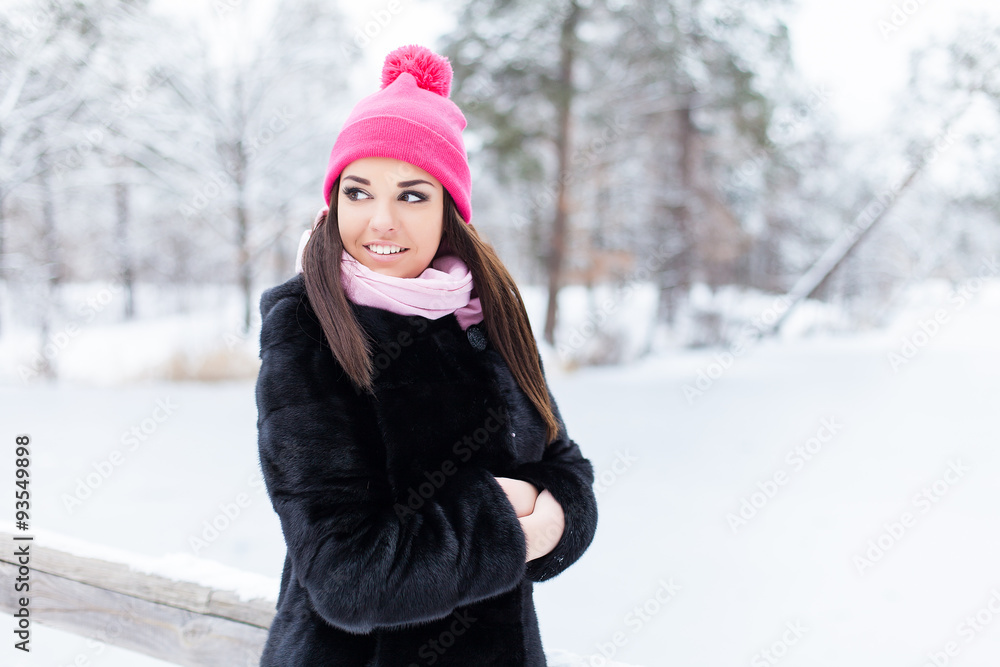 Winter woman in snow outside in nature. Portrait closeup outdoors in snow Winter woman in snow outside in nature. Portrait closeup outdoors in snow
