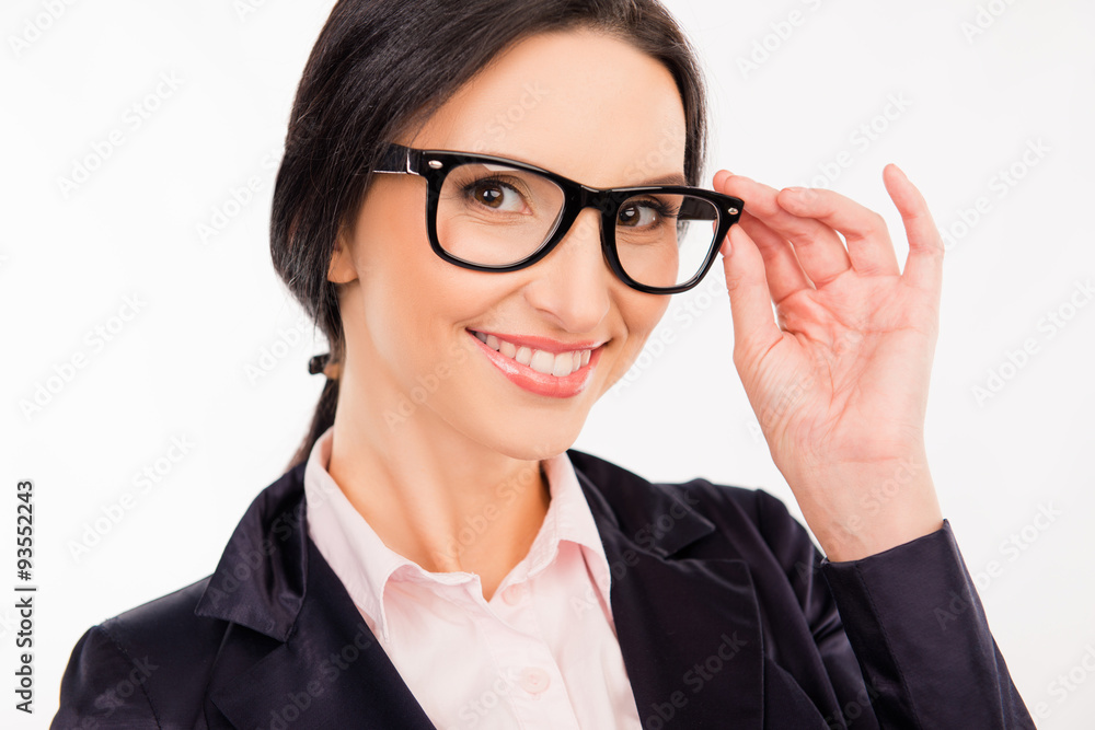 smart beautiful woman in glasses smiling and adjusting her glass smart beautiful woman in glasses smiling and adjusting her glass