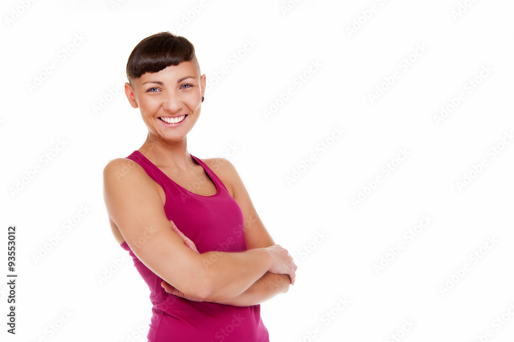 Young woman in fitness outfit with crossed arms over white backg Young woman in fitness outfit with crossed arms over white backg