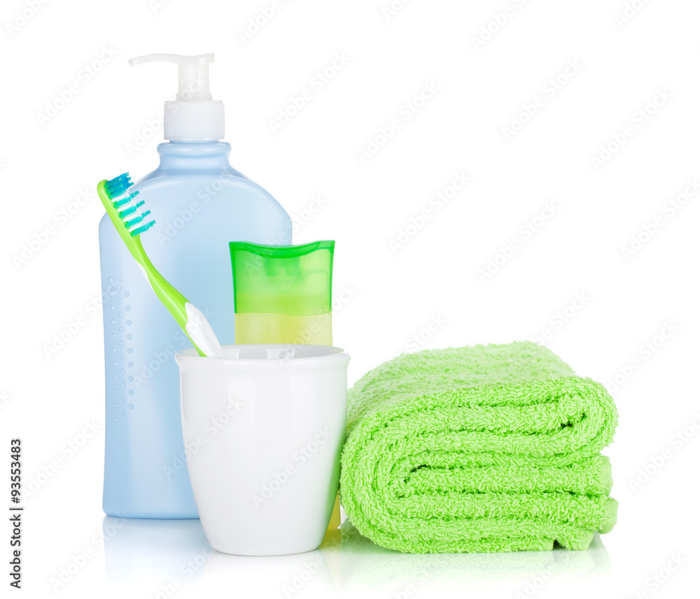 Toothbrush, cosmetics bottles and towel Toothbrush, cosmetics bottles and towel