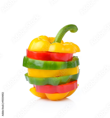 red, green and yellow sliced pepper isolated on white background