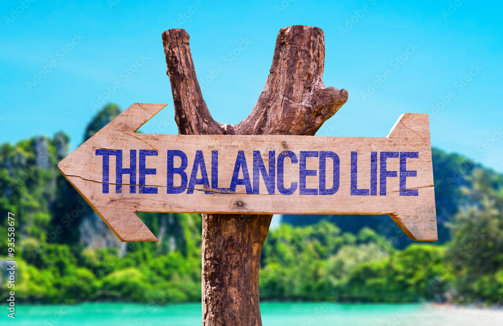 The Balance Life arrow with beach background