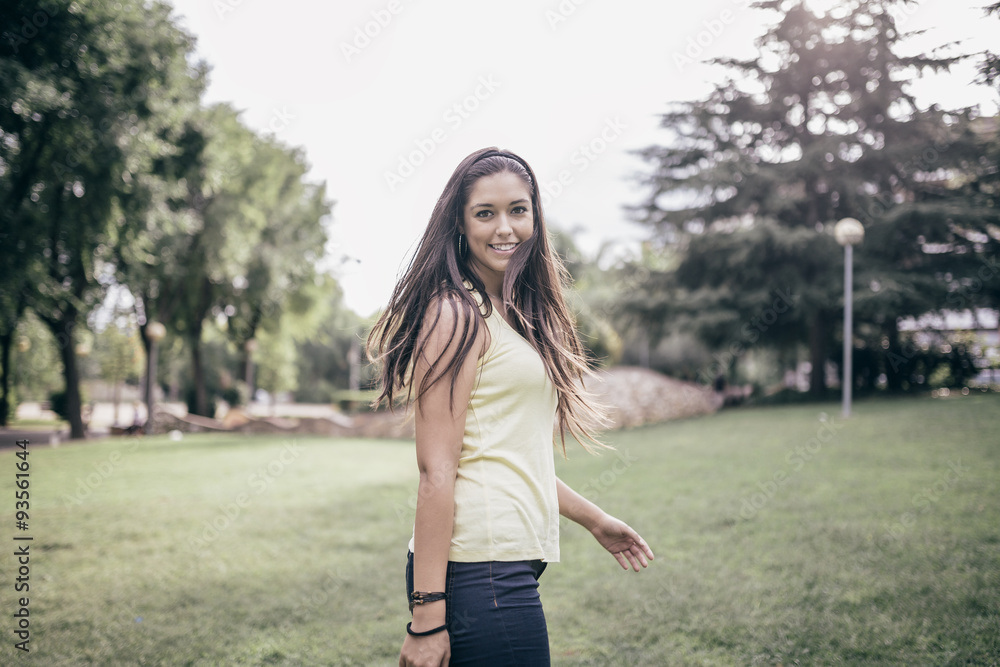 Beautiful young woman in the park. Happy portrait Beautiful young woman in the park. Happy portrait