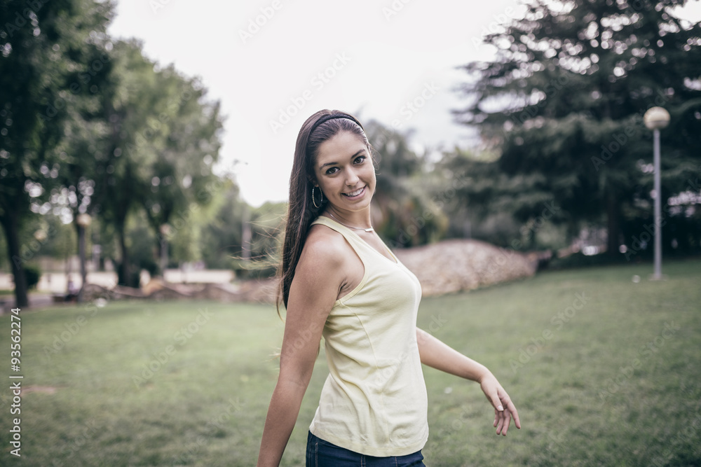Beautiful young woman in the park. Happy portrait Beautiful young woman in the park. Happy portrait