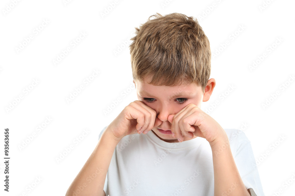 Portrait of emotional little boy on white background