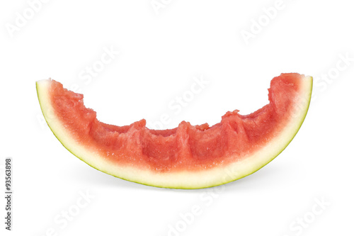 Bitten slice of watermelon on white background