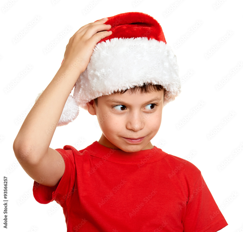 winter holiday christmas concept - boy in santa hat portrait on white isolated winter holiday christmas concept - boy in santa hat portrait on white isolated