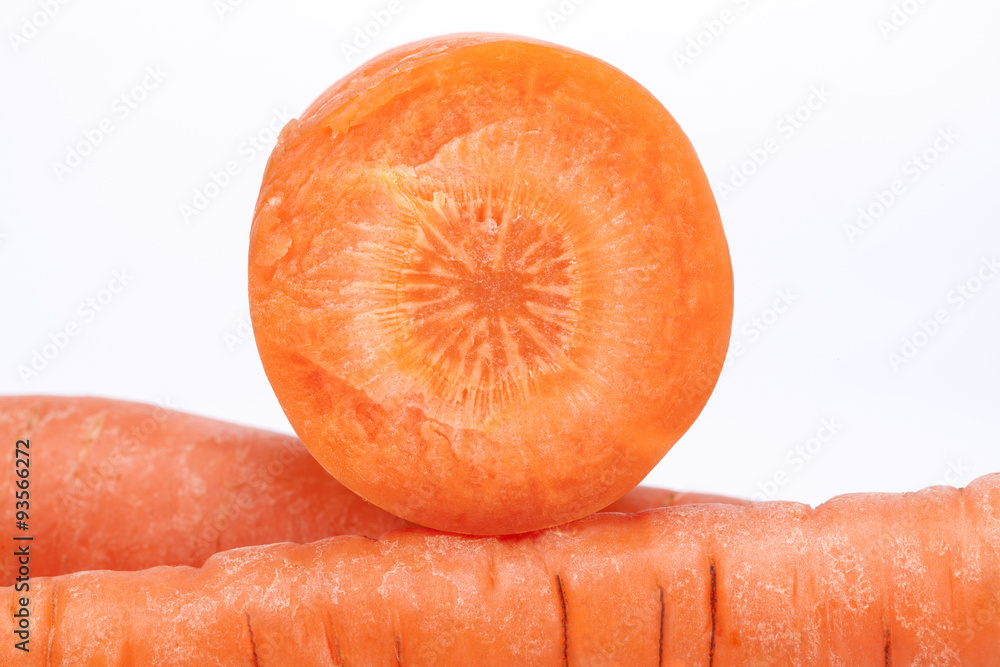 cut carrot on white background, close up cut carrot on white background, close up