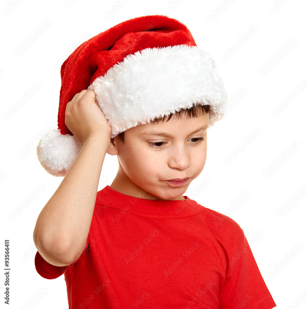 winter holiday christmas concept - boy in santa hat portrait on white isolated winter holiday christmas concept - boy in santa hat portrait on white isolated