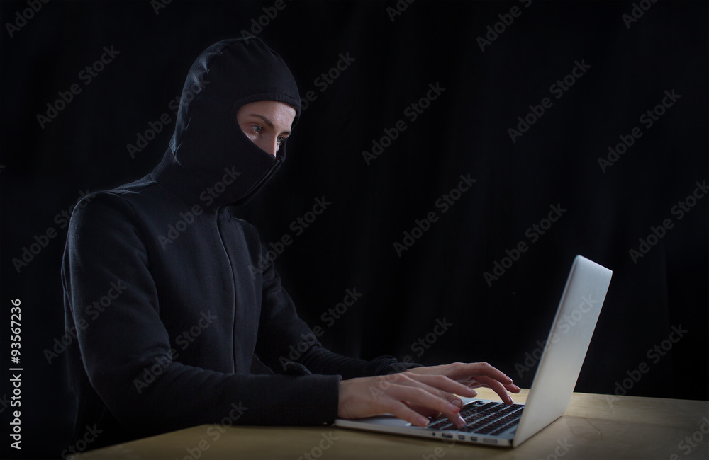 hacker at work with graphic user interface around hacker at work with graphic user interface around