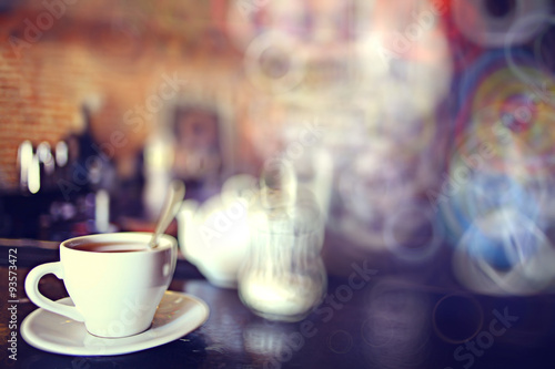 Photography cup of tea at a cafe blurred background