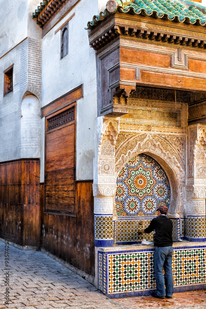Fototapeta premium Water fountain in the old town medina of Fez, Morocco.