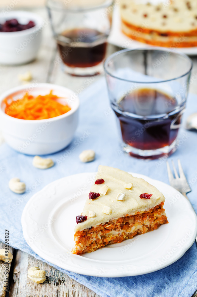 raw vegan carrot cake with cashew cream and dried cranberries raw vegan carrot cake with cashew cream and dried cranberries