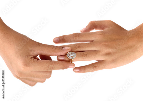 Ring in hand woman isolate on white background.