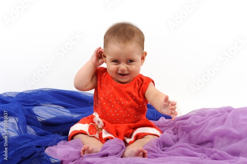 Cute and happy newborn baby playing, smiling, laughing with great pose