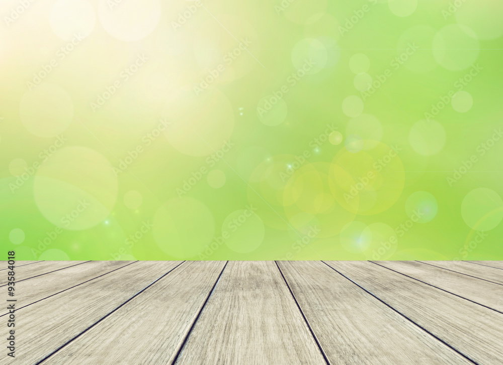 Bright spring with circular bokeh background and wooden floor Bright spring with circular bokeh background and wooden floor
