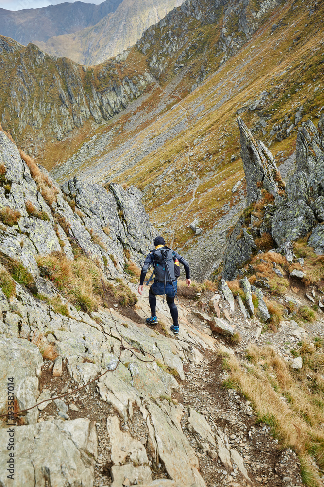Naklejka premium Caucasian hiker with backpack