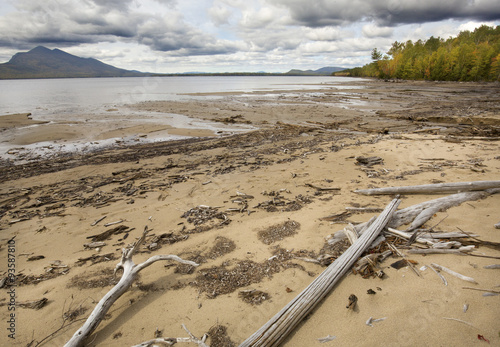 Low water makes a wide beach at Flagstaff Lake, Maine. photo