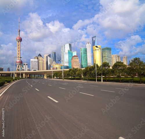 Empty road with Shanghai Lujiazui city buildings