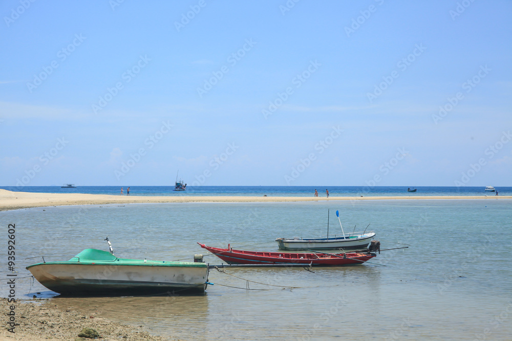 a lot of ferry boats parking at the beach. a lot of ferry boats parking at the beach.