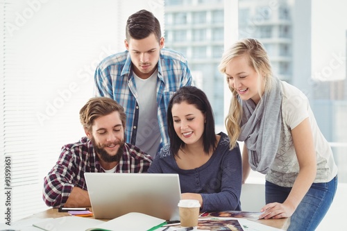 Happy Business people using laptop 