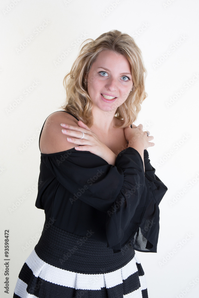 Blond young woman with a black and white dress Blond young woman with a black and white dress