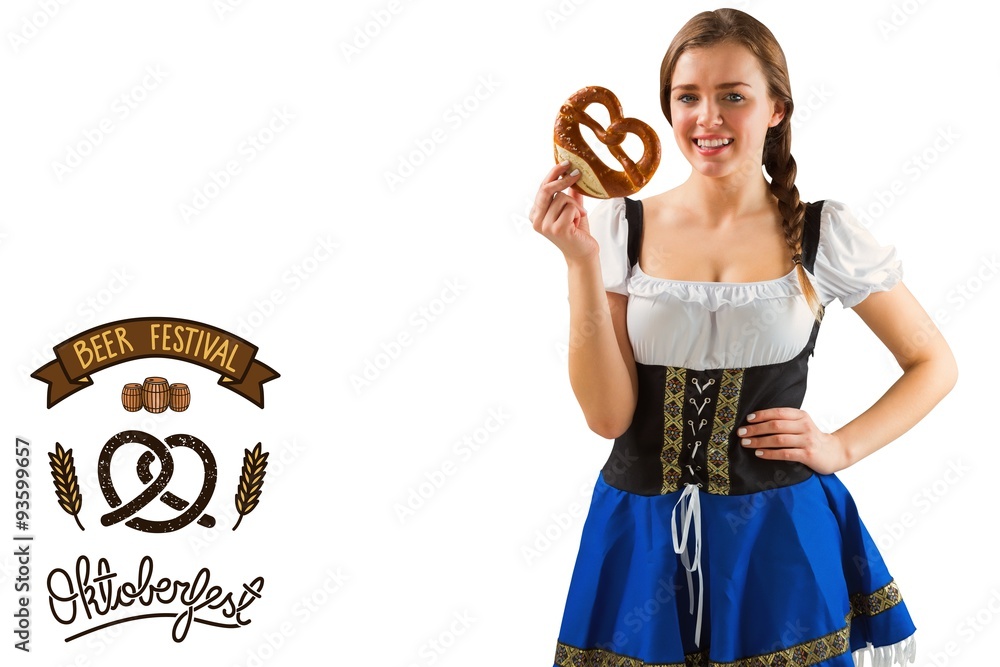 Composite image of pretty oktoberfest girl holding pretzel Composite image of pretty oktoberfest girl holding pretzel