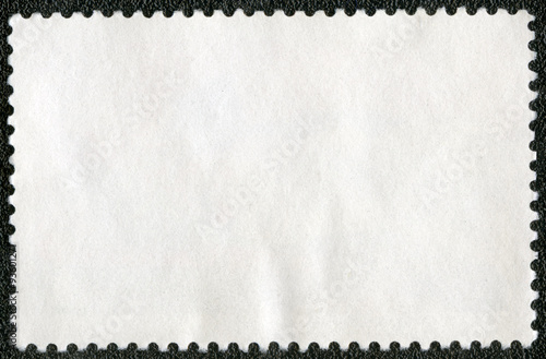 Blank postage stamp sheet on a black background