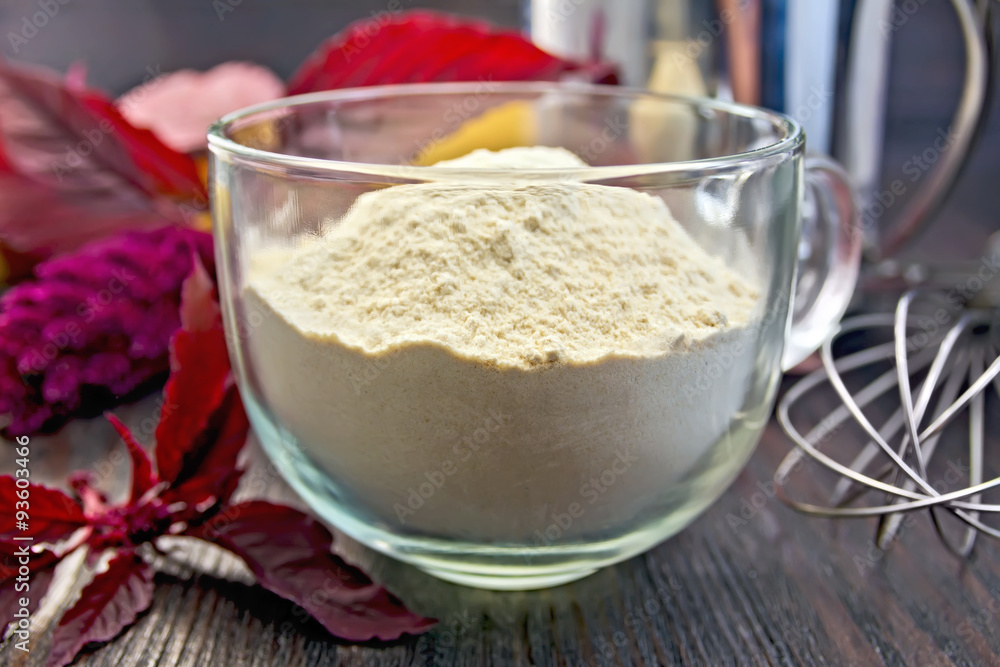 Flour amaranth in glass cup on board Flour amaranth in glass cup on board