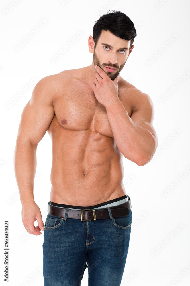 Confident athletic man with nude torso