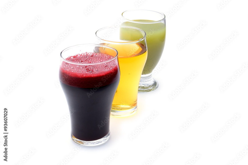 Fresh fruit and vegetable juices on white background Fresh fruit and vegetable juices on white background