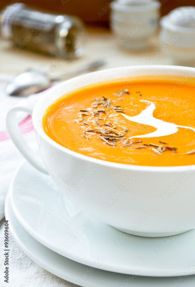 Vegetarian carrot-pumpkin cream soup with garlic and cumin Vegetarian carrot-pumpkin cream soup with garlic and cumin
