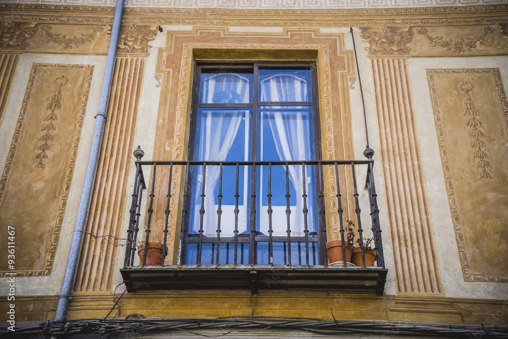 Fototapeta premium Traditional architecture with balconies and old windows, city of