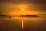 Idyllic landscape with lake towards the rising sun