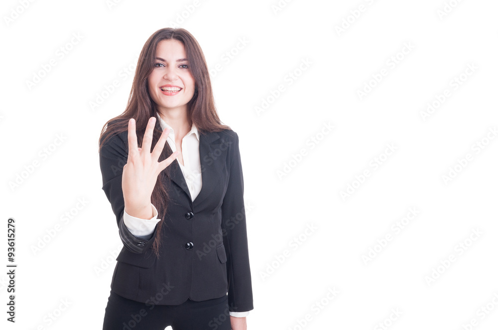 Young business female showing number four with fingers Young business female showing number four with fingers