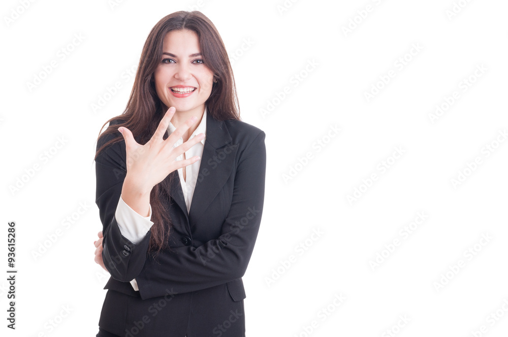 Young business female showing number five with fingers Young business female showing number five with fingers