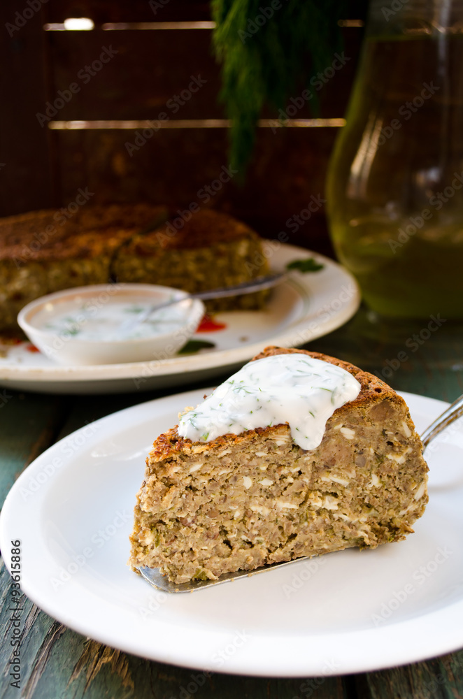 Vegetarian lentil-mushroom pie and yogurt dip with dill