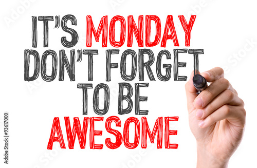 Hand with marker writing: Its Monday Don't Forget to be Awesome photo