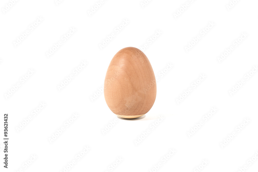 Pear wooden egg on white background Pear wooden egg on white background