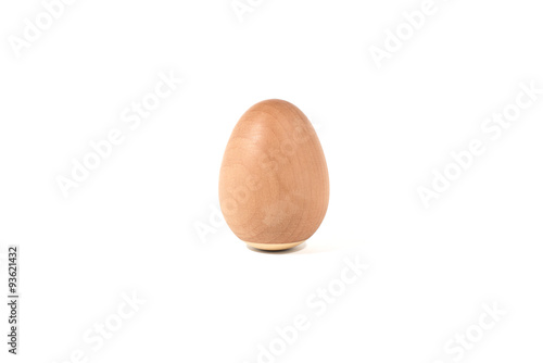 Pear wooden egg on white background