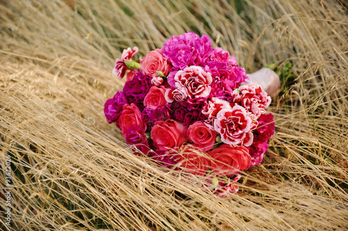 Wedding bouquet on the grass © serav