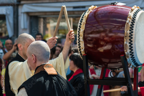 Two Japanese Taiko Drummers during Traditional Show