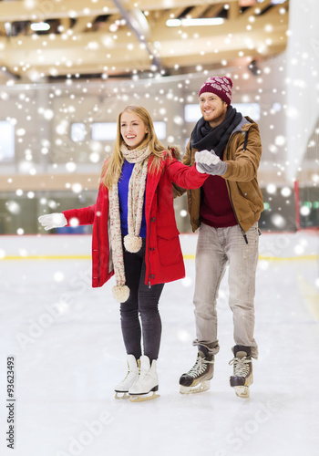happy couple on skating rink